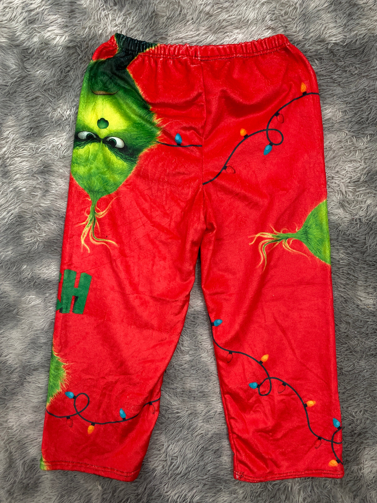 Grinch fondo rojo  Pantalón De Pijama Caballero