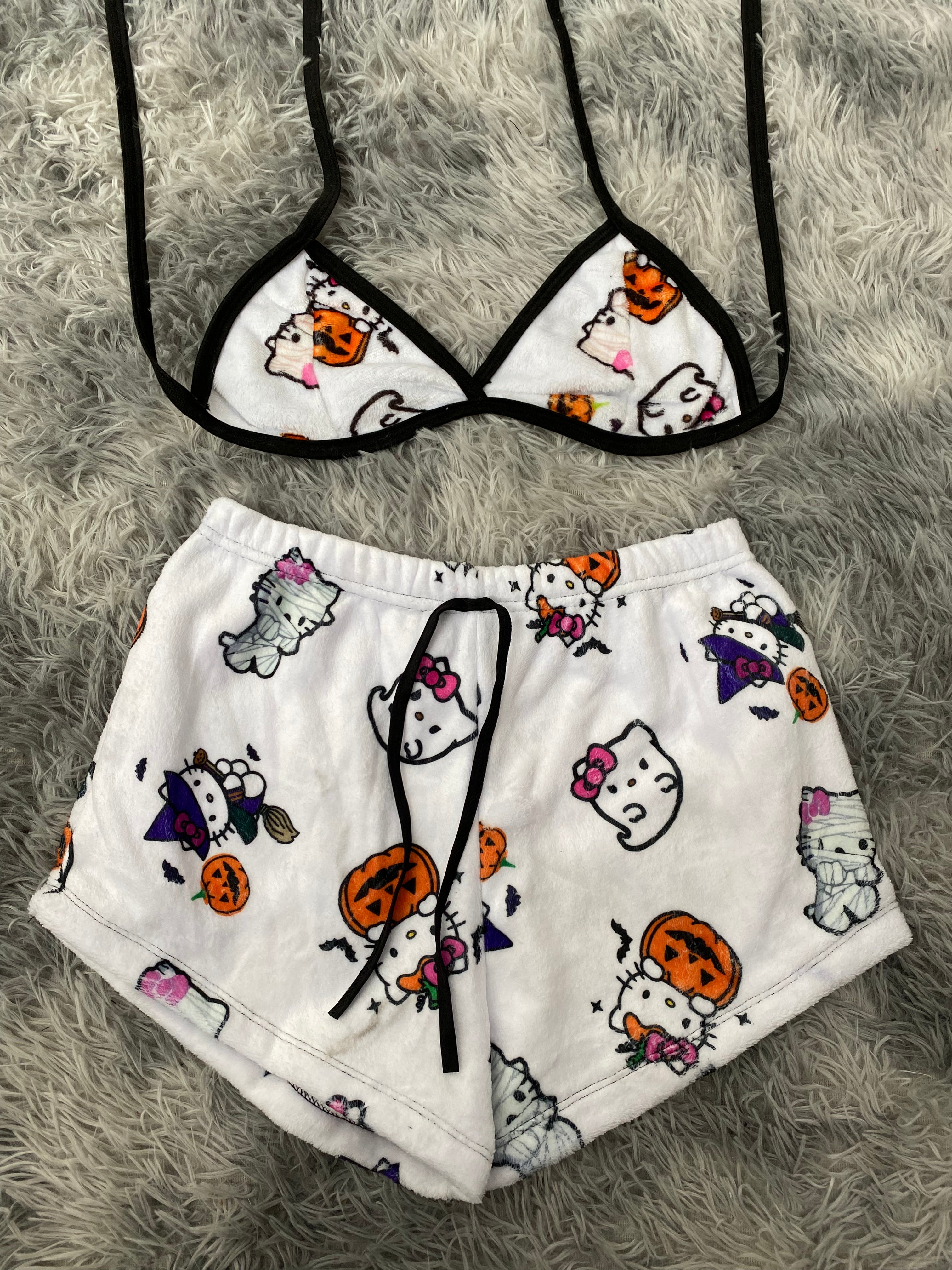 Hello kitty halloween fondo blanco top con short unitalla de afelpado