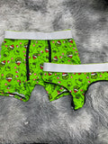 Grinch Esfera Fondo Verde Duo Unitalla Con Tanga