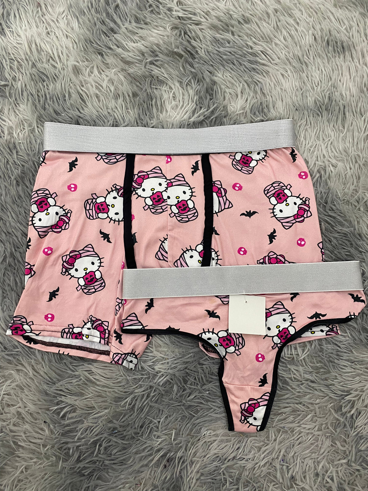 Hello kitty momia fondo rosa Dúo con tanga unitalla Xl