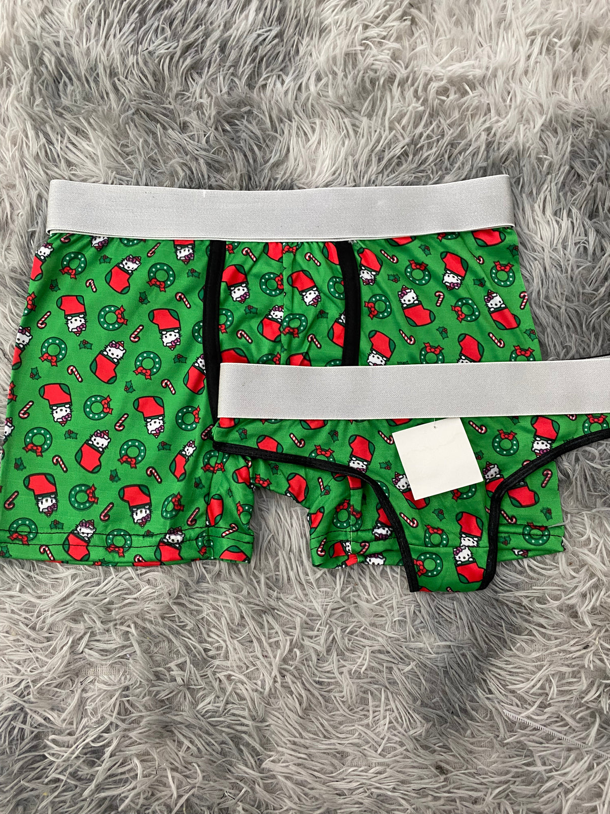 Hello Kitty bota de navidad fondo verde Duo Con Tanga Xl