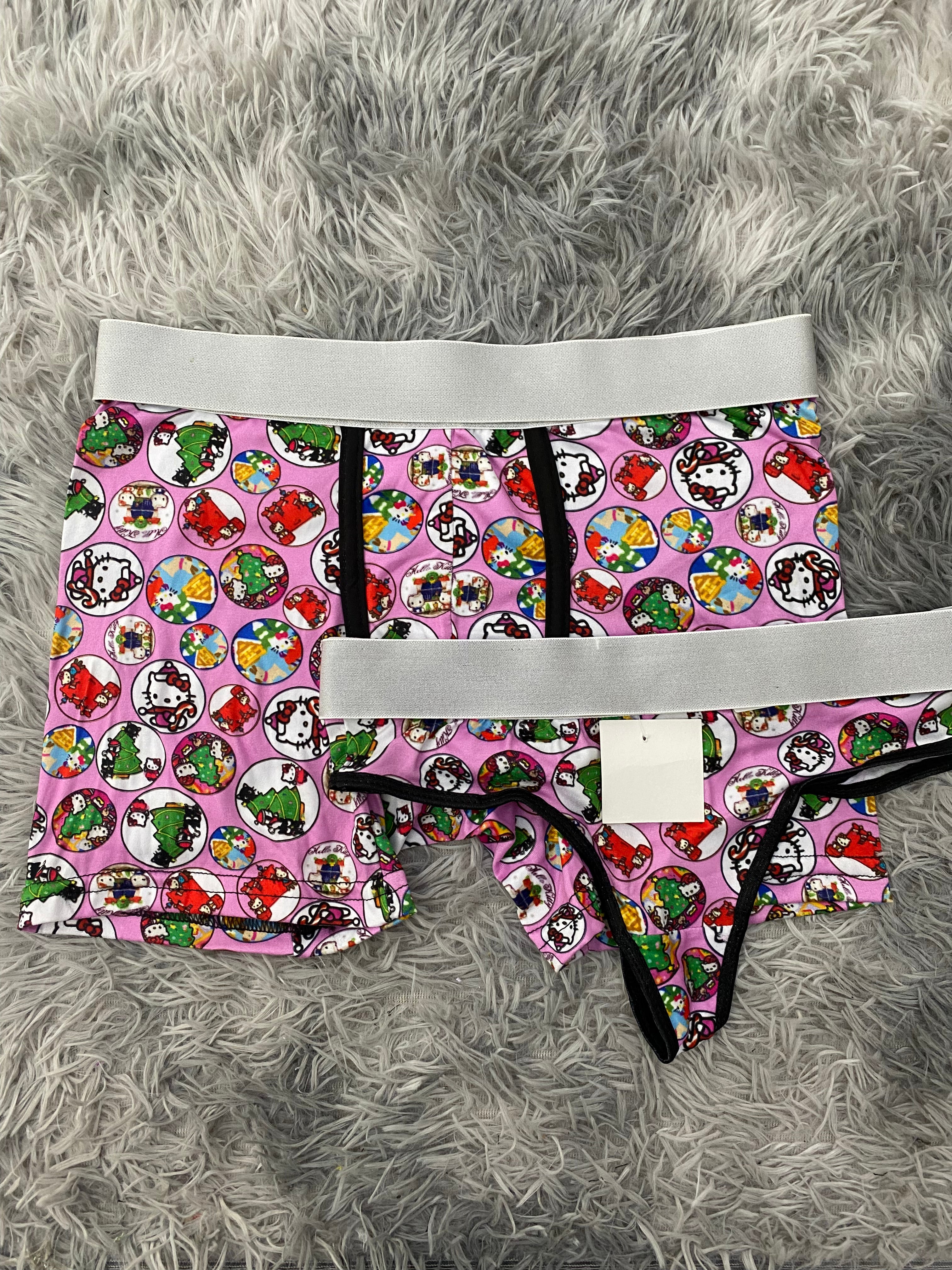 Hello Kitty circules de navidad fondo morado Duo Unitalla Con Tanga