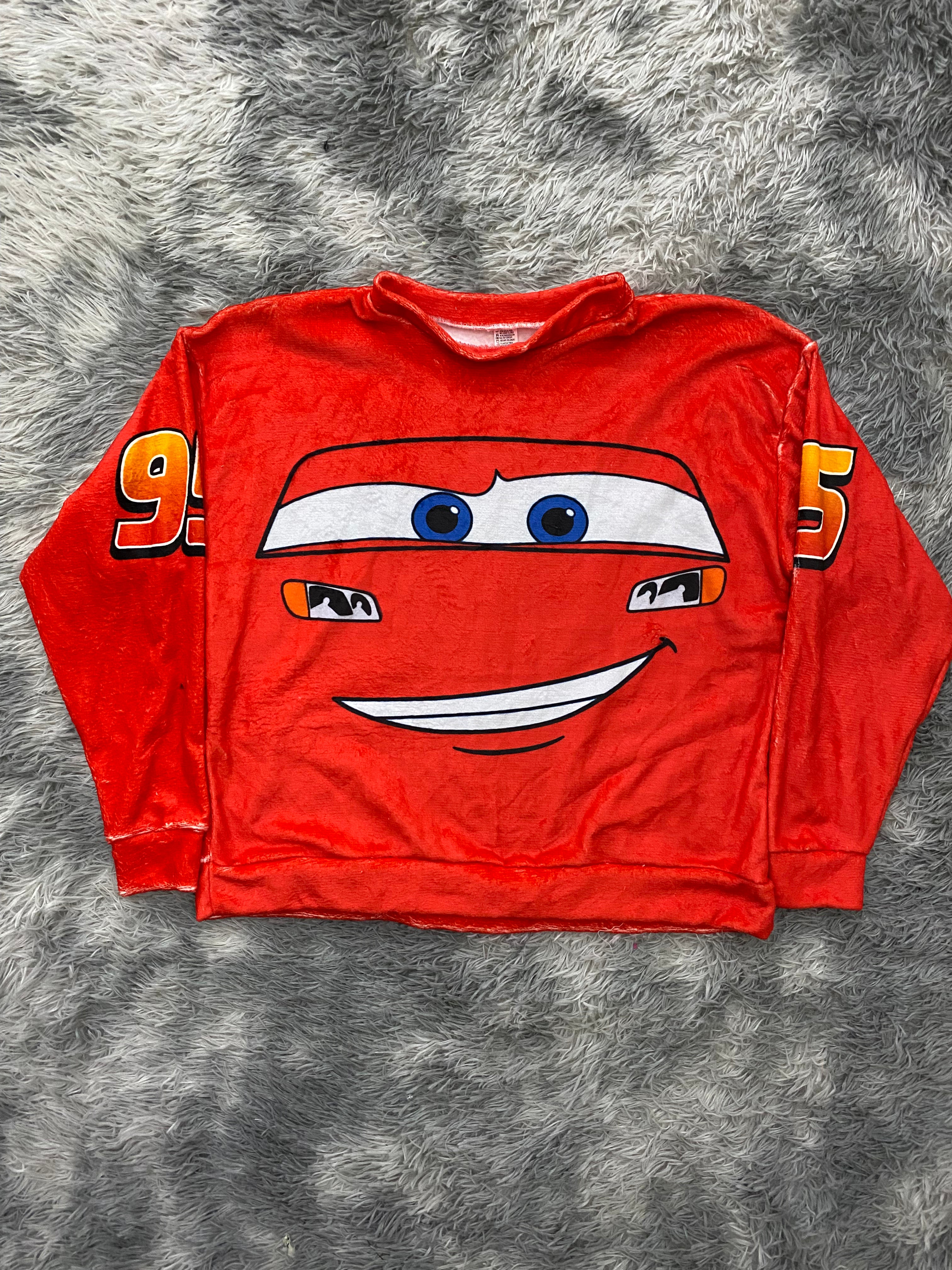 suéter navideño de rayo McQueen cara